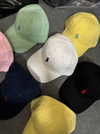 A QC POLO CAP