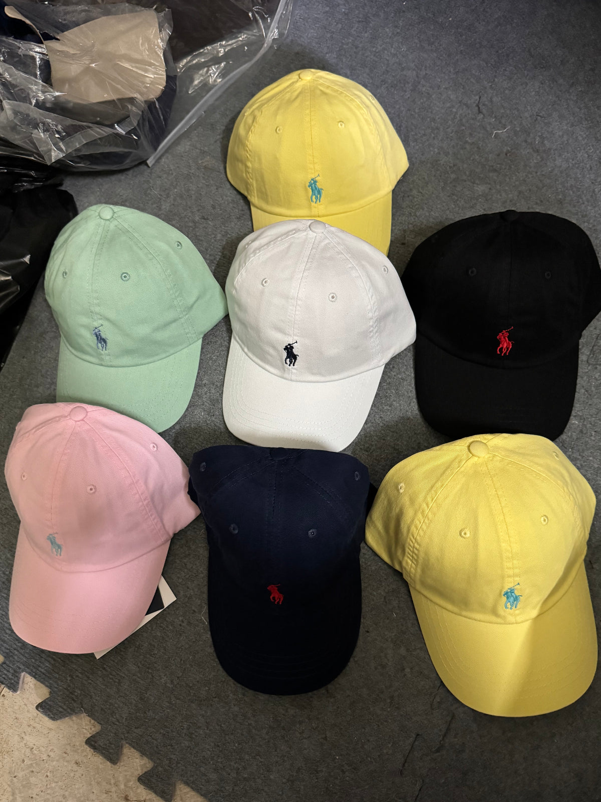 A QC POLO CAP