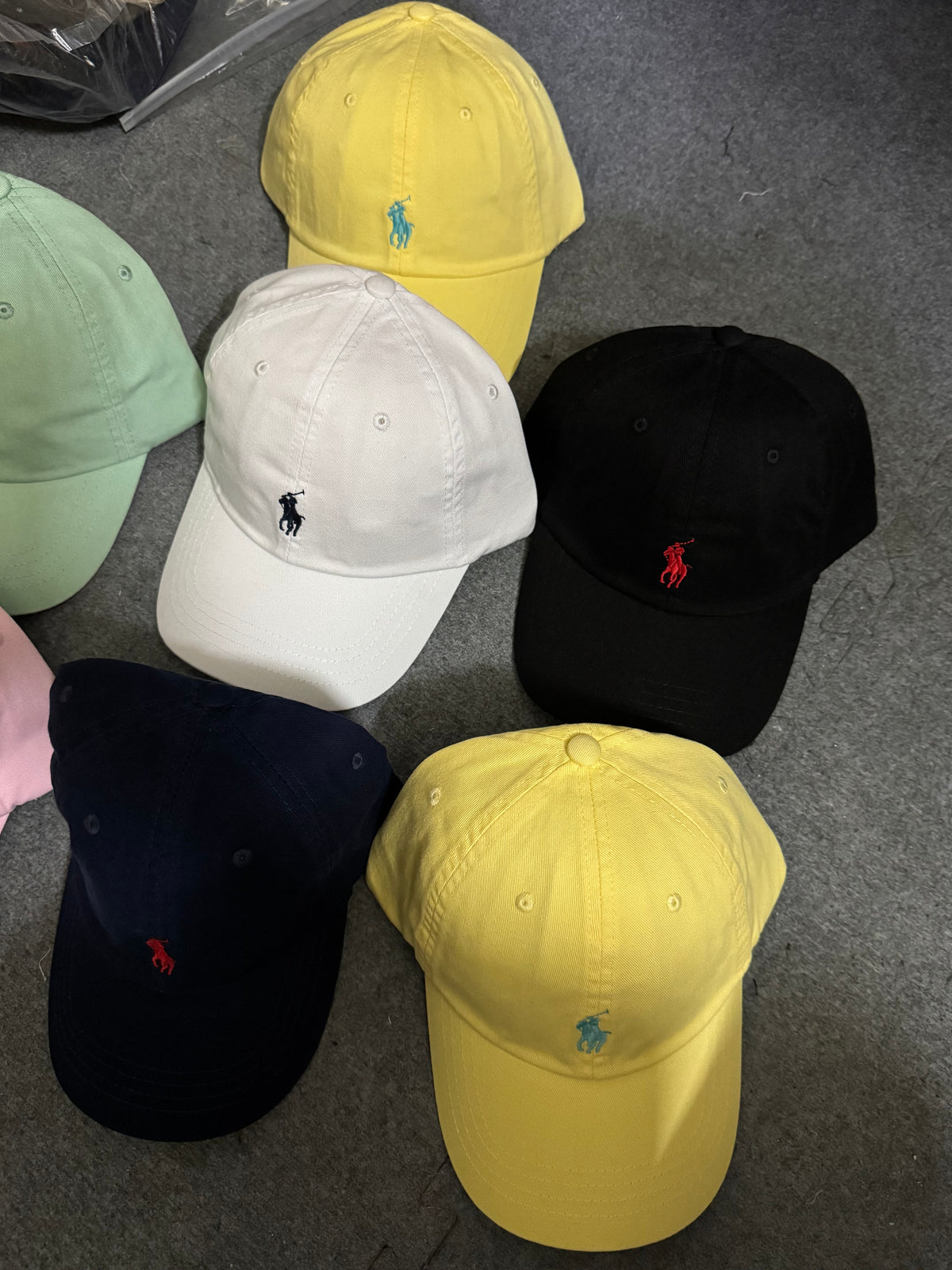 A QC POLO CAP