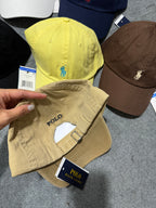 A QC POLO CAP